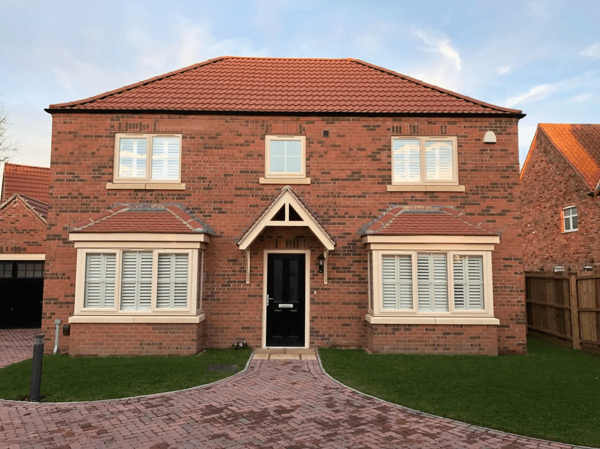 Exterior view of Hull home with plantation shutters