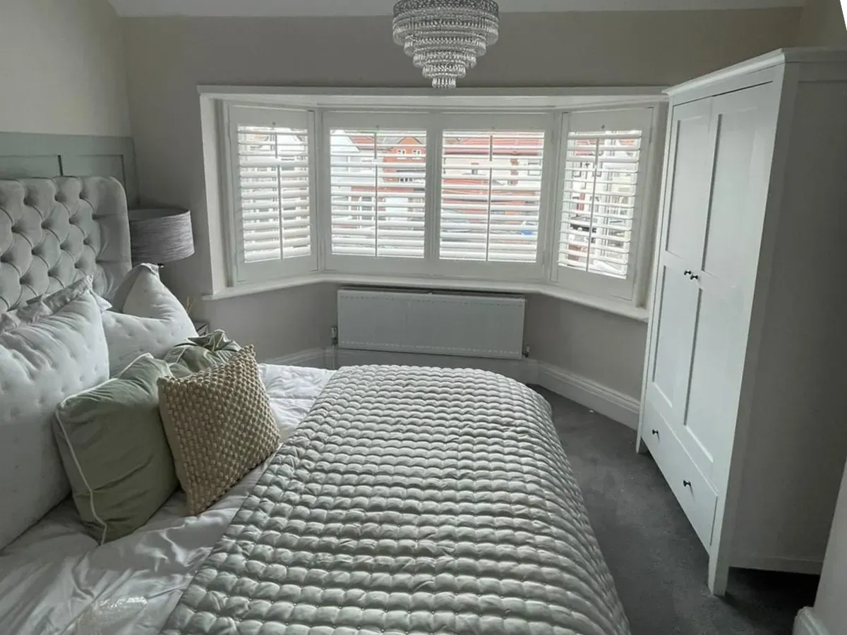 Hull bedroom with bay window shutters